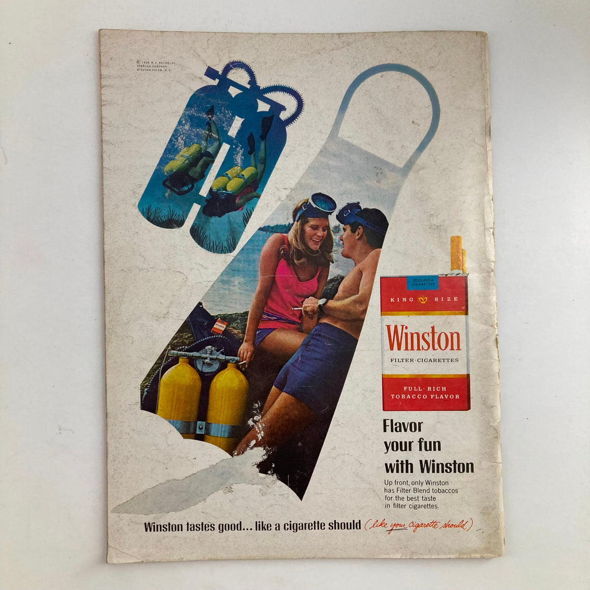 Advertisement page from VTG Newsweek Magazine April 29 1968 for Winston Filter Cigarettes, featuring a couple by the ocean with scuba gear and promoting the cigarette brand.