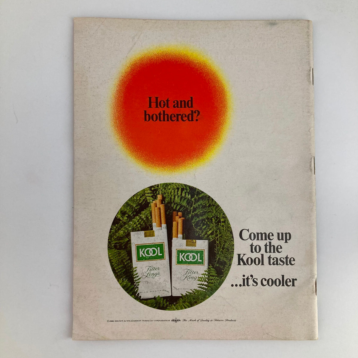 Vintage advertisement from the VTG Newsweek Magazine December 23, 1968, featuring a Kool cigarette brand and the slogan 'Hot and bothered? Come up to the Kool taste...it's cooler.'