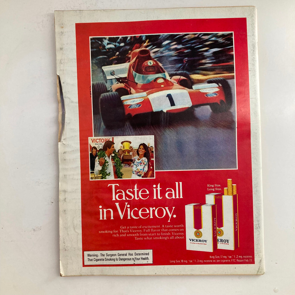Back cover of VTG Newsweek Magazine November 12, 1973, featuring a vibrant advertisement for Viceroy cigarettes with racing imagery.