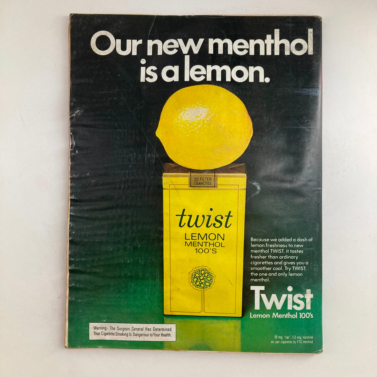 VTG Newsweek Magazine November 19, 1973 cover featuring an advertisement for Twist Lemon Menthol 100's cigarettes, showcasing a lemon on the packaging with bold text stating 'Our new menthol is a lemon.'