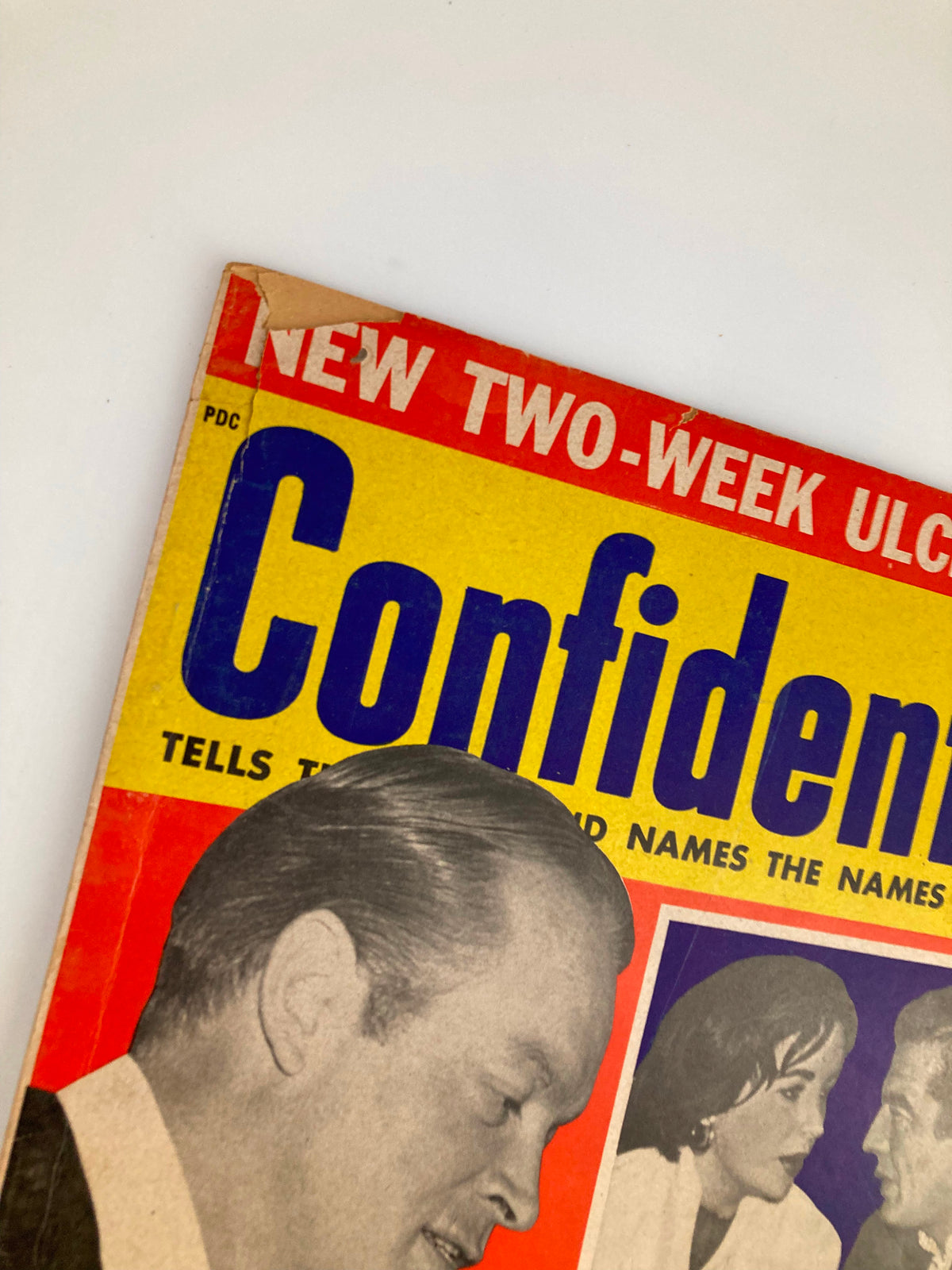 Close-up of VTG Confidential Magazine July 1956 cover highlighting Bob Hope and graphical elements, emphasizing its vintage charm and nostalgic appeal.