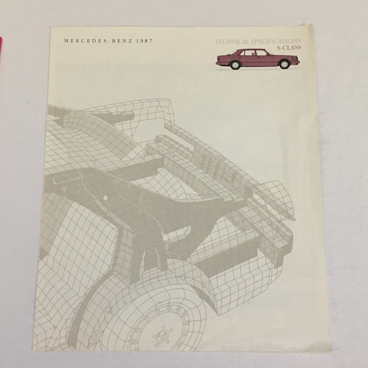 Front cover of the 1987 Mercedes-Benz S-Class Specifications Dealership Car Auto Brochure Catalog, featuring a technical illustration of the vehicle.