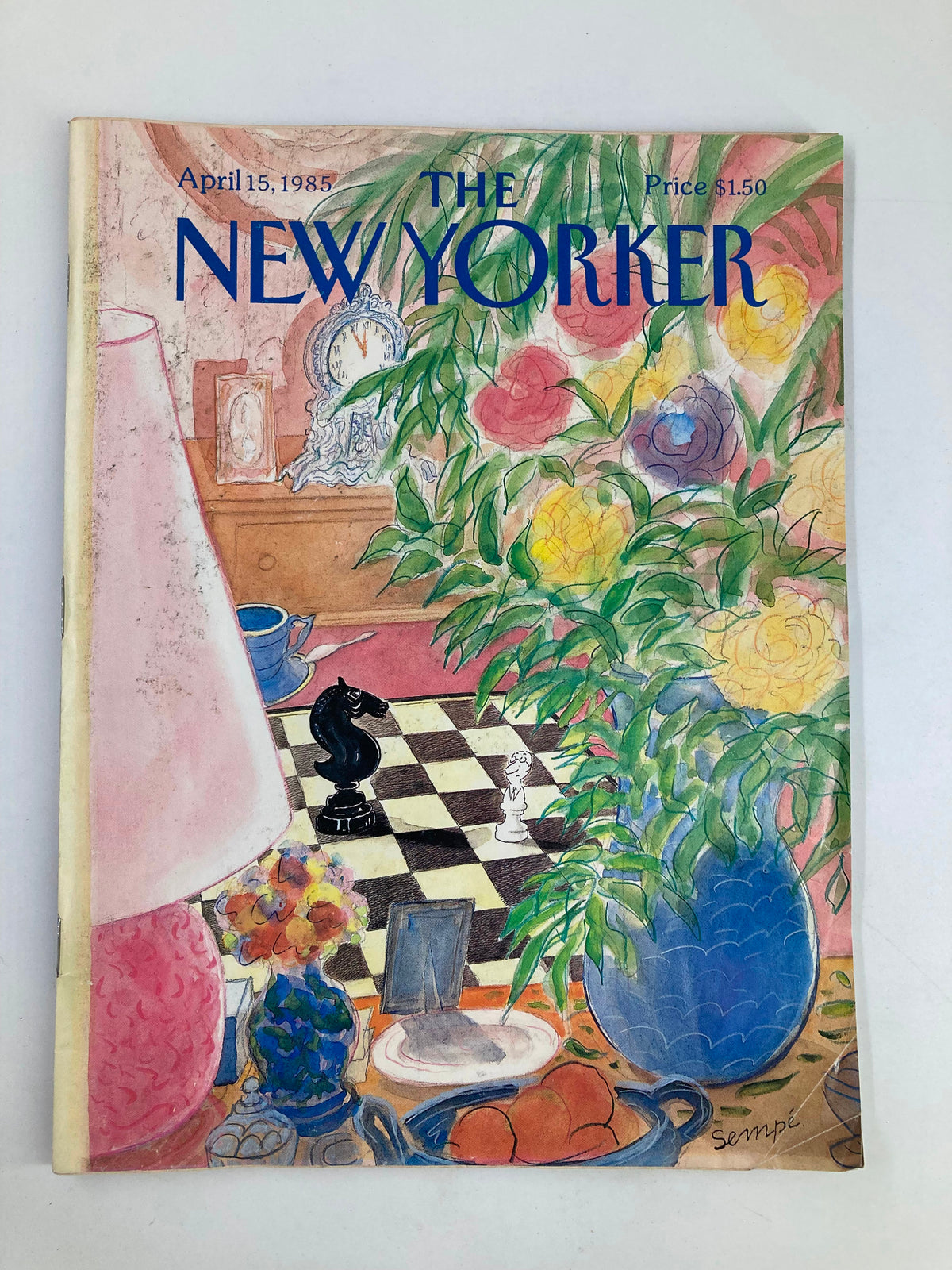 Cover of The New Yorker Magazine April 15 1985 featuring a colorful illustration of a chess game by Jean-Jacques Sempe, showcasing vibrant flowers and a checkered board.
