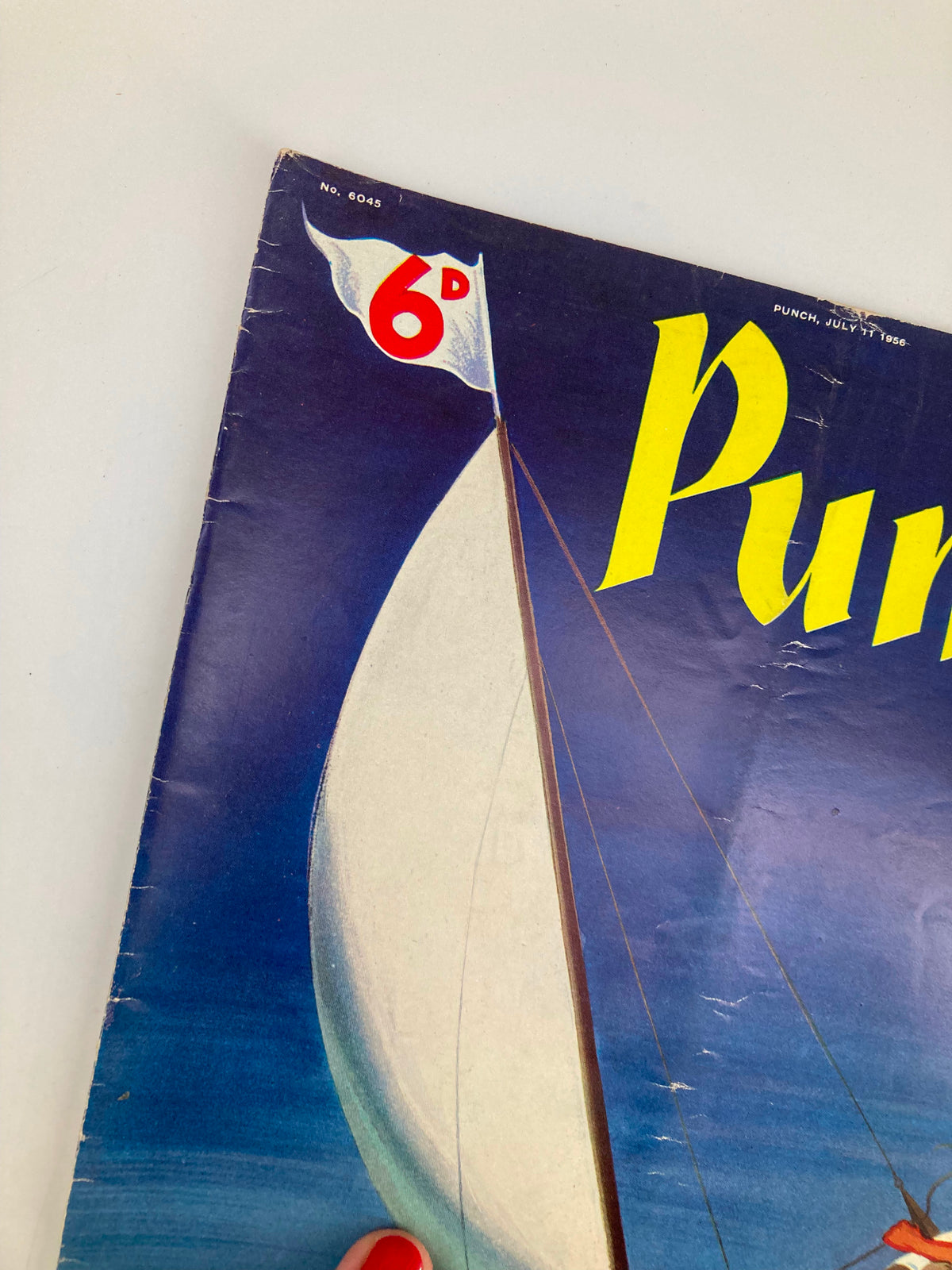 Close-up of the upper corner of the VTG Punch Magazine July 11 1956 showing the price and publication date.