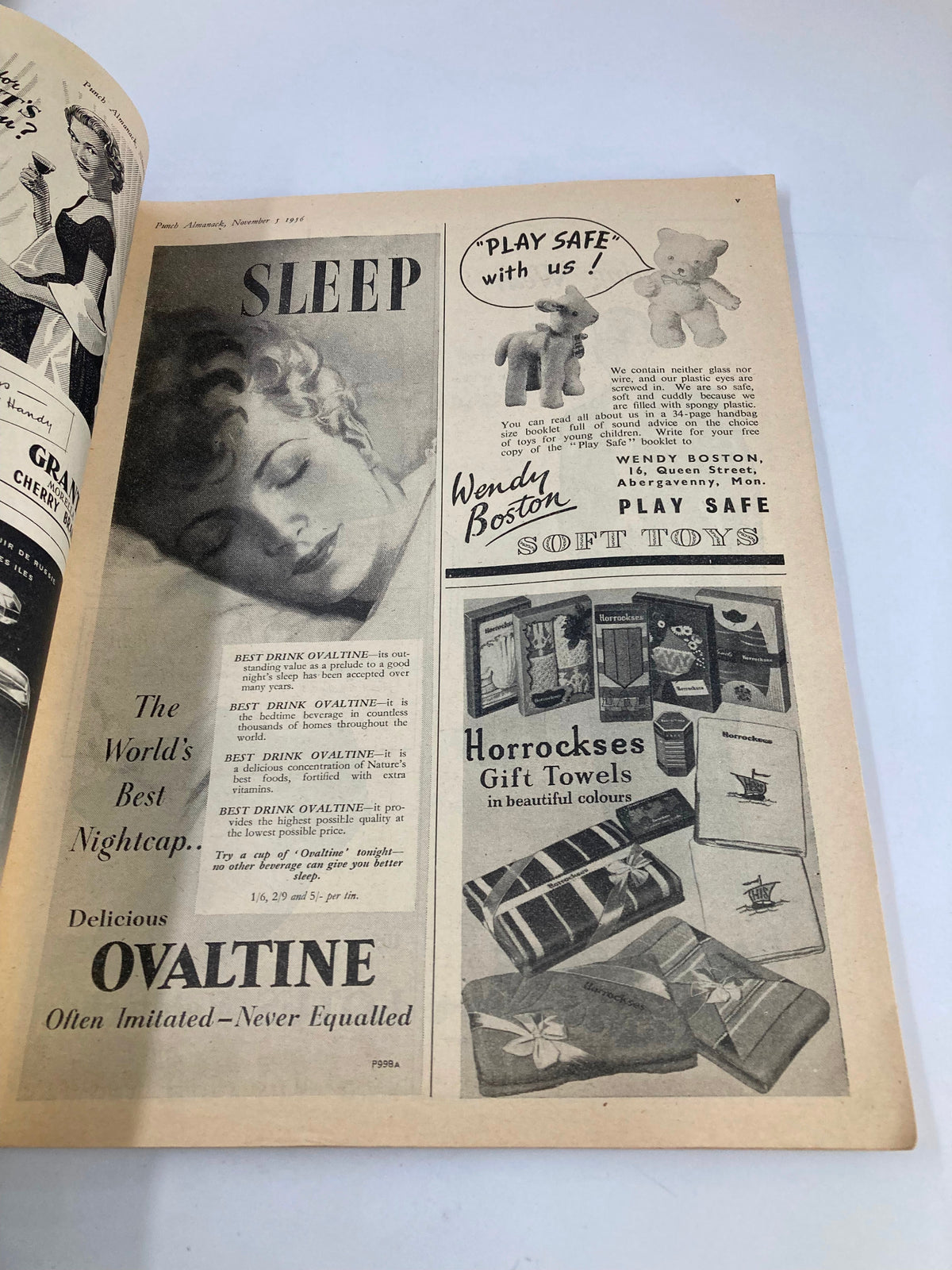 Interior page of VTG Punch Magazine from November 5, 1956 featuring advertisements including Ovaltine and toys, reflecting the mid-20th century culture and lifestyle.