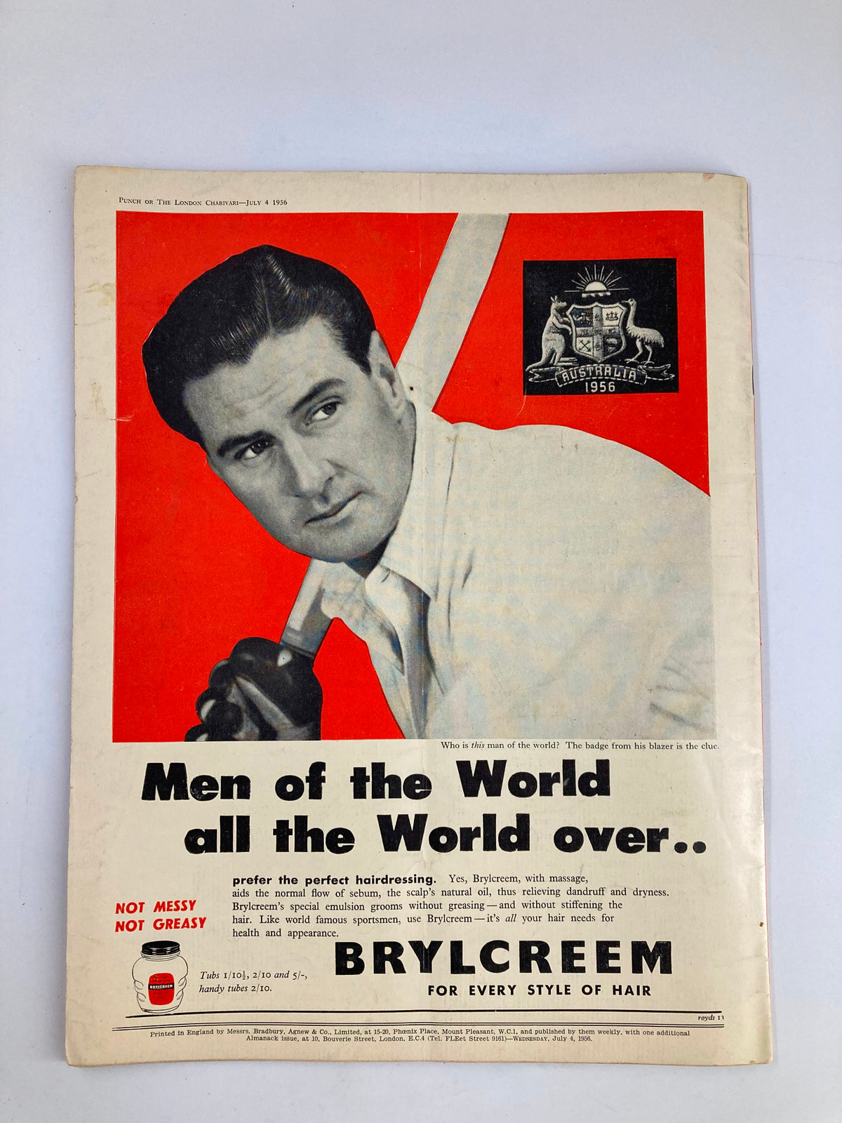 Cover of VTG Punch Magazine July 4 1956 featuring a man with a cricket bat, advertising Brylcreem hair product, encapsulating mid-20th century marketing style.