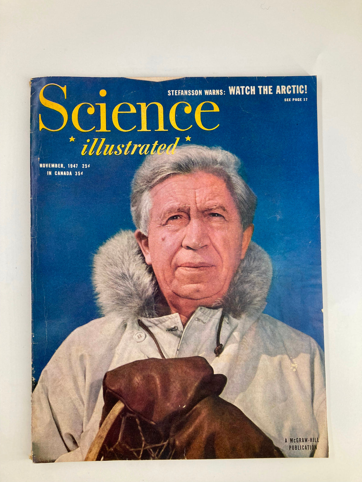 Cover of the November 1947 issue of Science Illustrated Magazine featuring a man in winter clothing, emphasizing the title 'Science Illustrated' and the issue's focus on historical scientific exploration.