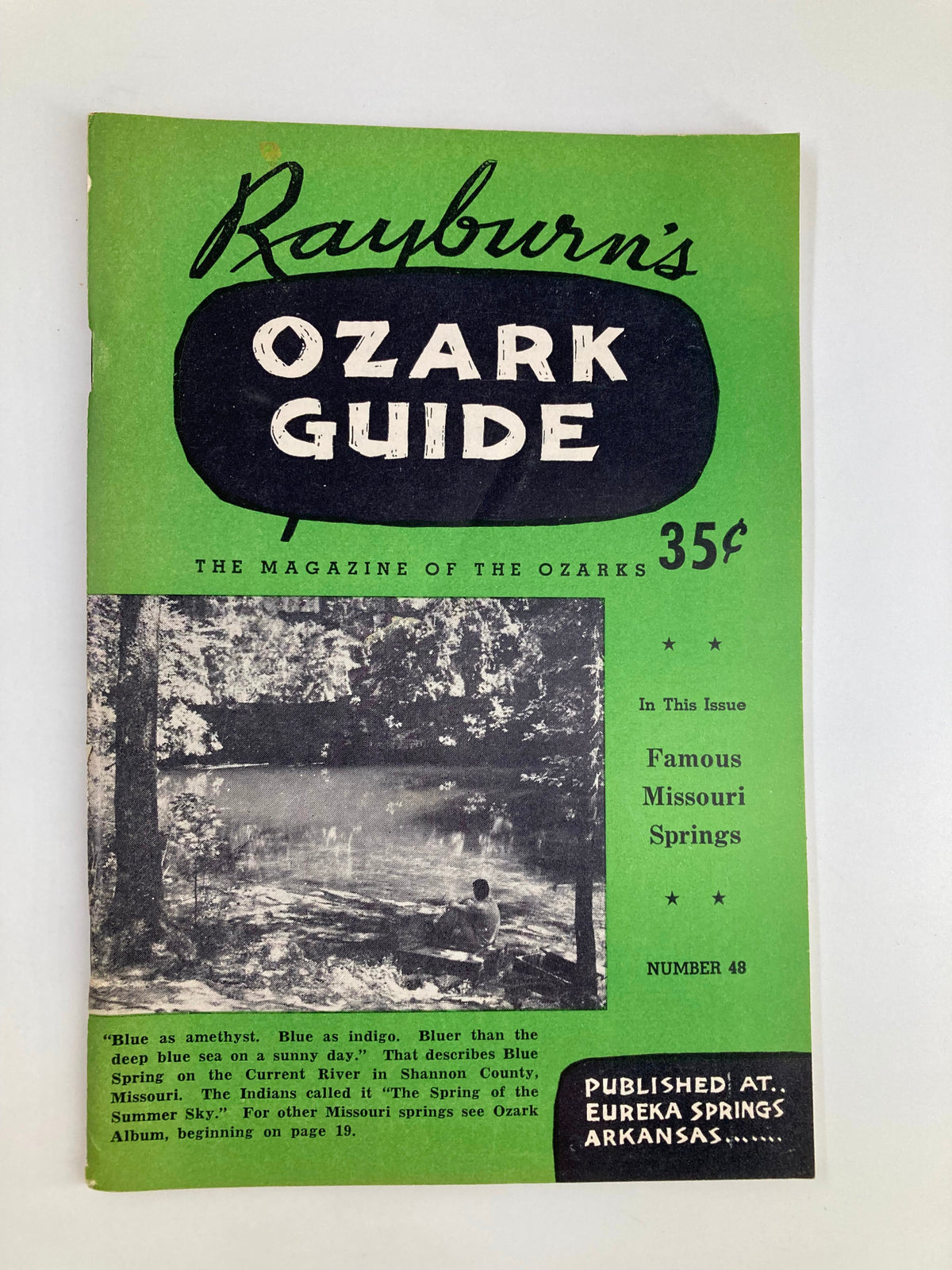 Cover of Rayburn's Ozark Guide Magazine from April 1956 featuring a scenic view of Blue Spring in Shannon County, Missouri, highlighting famous Missouri springs and vintage design elements.