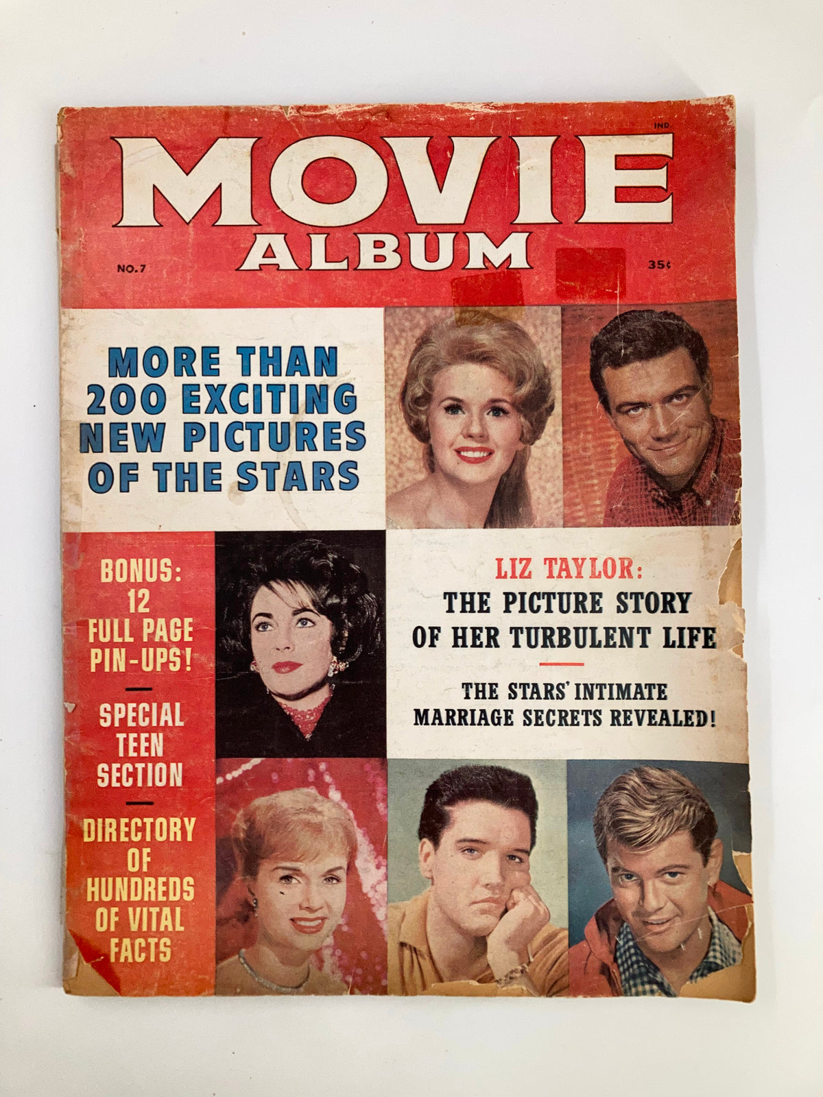 Cover of the VTG Movie Album Magazine 1961 No. 7 featuring Roger Smith, Liz Taylor, and other stars, highlighting 'The Picture Story of Her Turbulent Life' with bold headlines and colorful images.