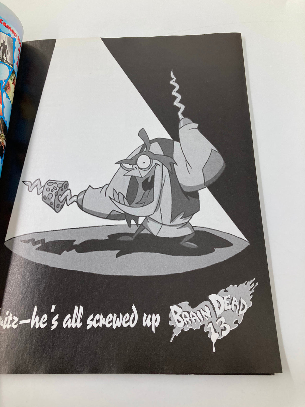 GamePro Magazine February 1995 - Black and white comic-style art for 'Brain Dead 13,' featuring a quirky character and promotional text.