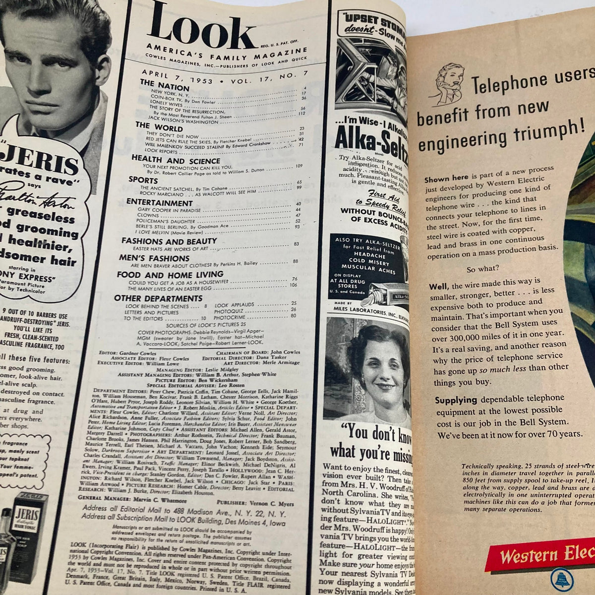 Inside pages of VTG Look Magazine April 7 1953 displaying table of contents, articles, and vintage advertisements, offering a glimpse into 1950s pop culture.