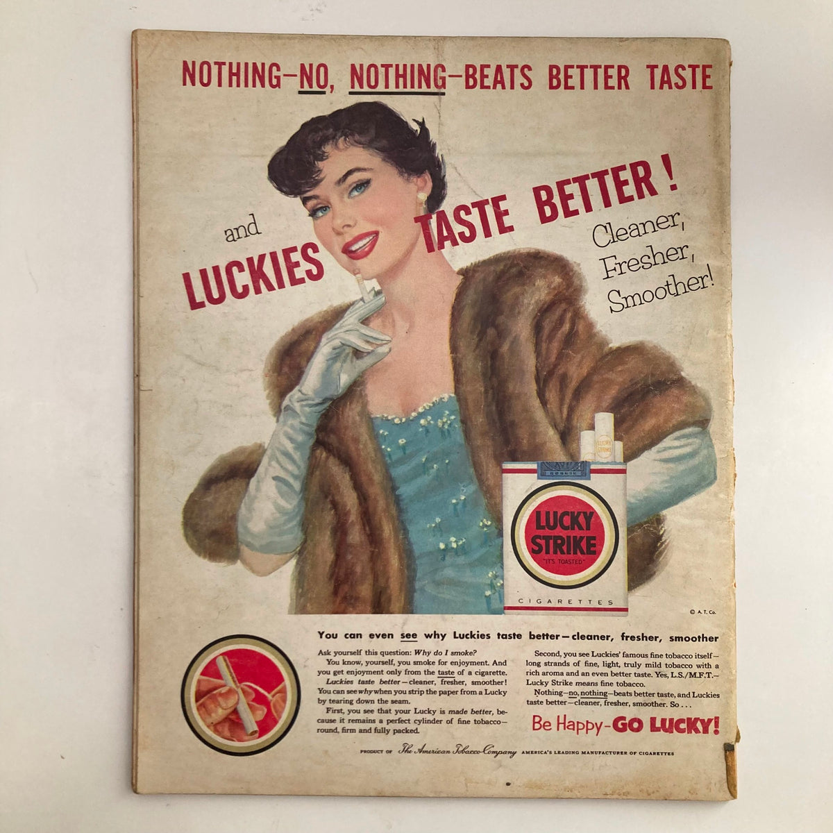 Advertisement page in VTG Look Magazine April 7 1953 for Lucky Strike cigarettes, featuring a glamorous model, highlighting mid-century advertising styles.