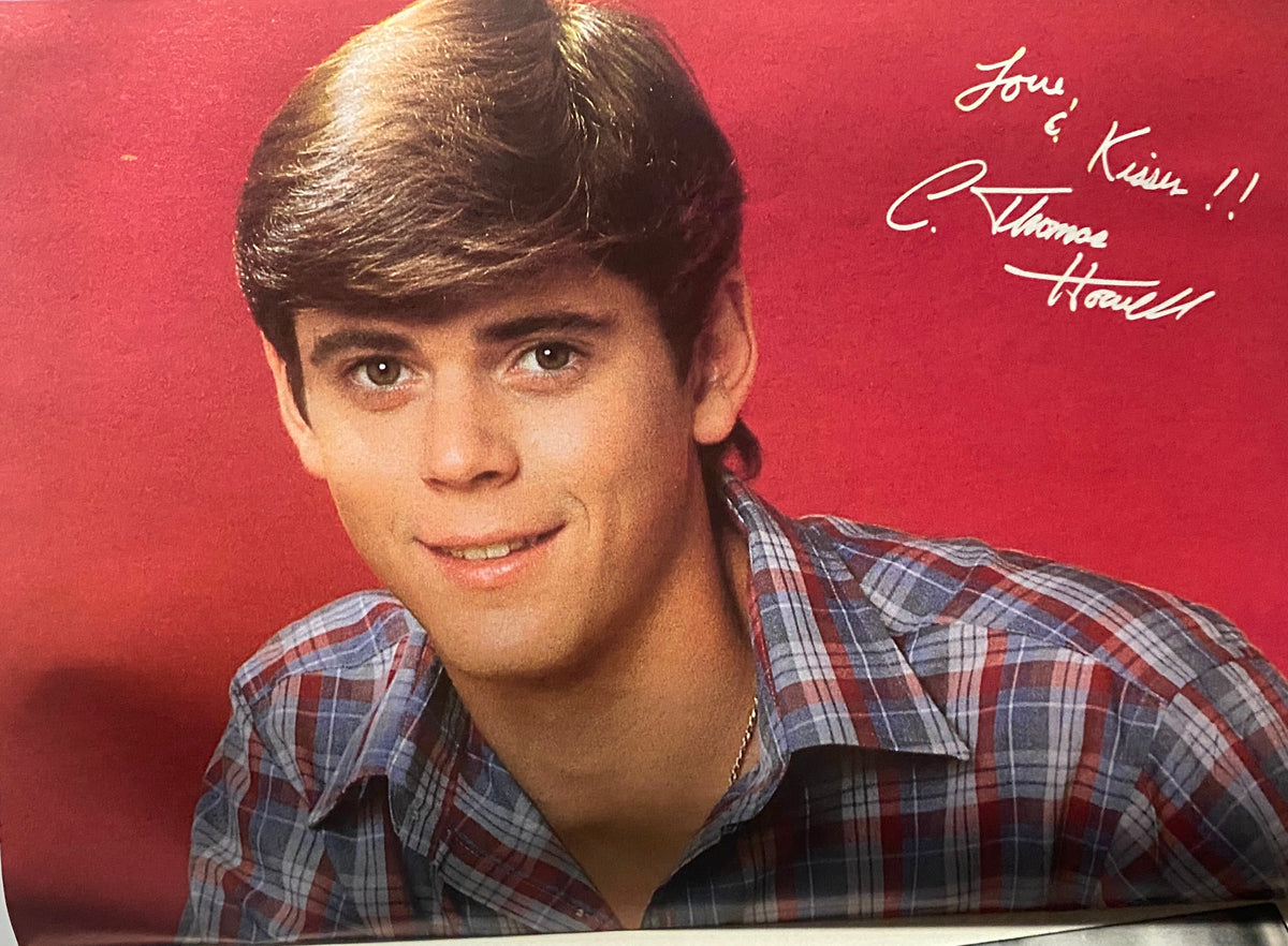 C. Thomas Howell smiling in a signed photo from SuperTeen Magazine February 1984, encapsulating the essence of '80s teen fandom.