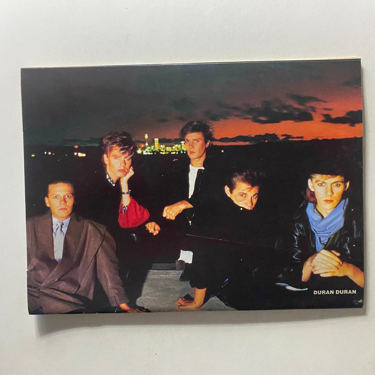 SuperTeen Magazine February 1984 featuring a vintage photo of the band Duran Duran against a dramatic sunset backdrop. This iconic image captures the essence of '80s pop culture.