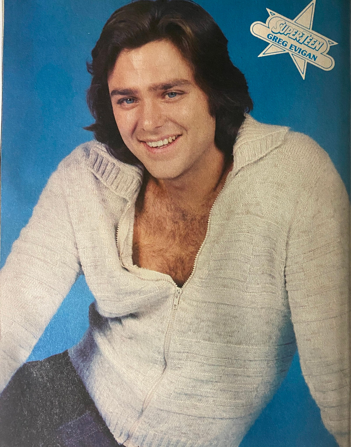 Stylized image of actor Greg Evigan from SuperTeen Special No. 4, capturing the essence of 1980s pop culture with his stylish sweater and confident smile.