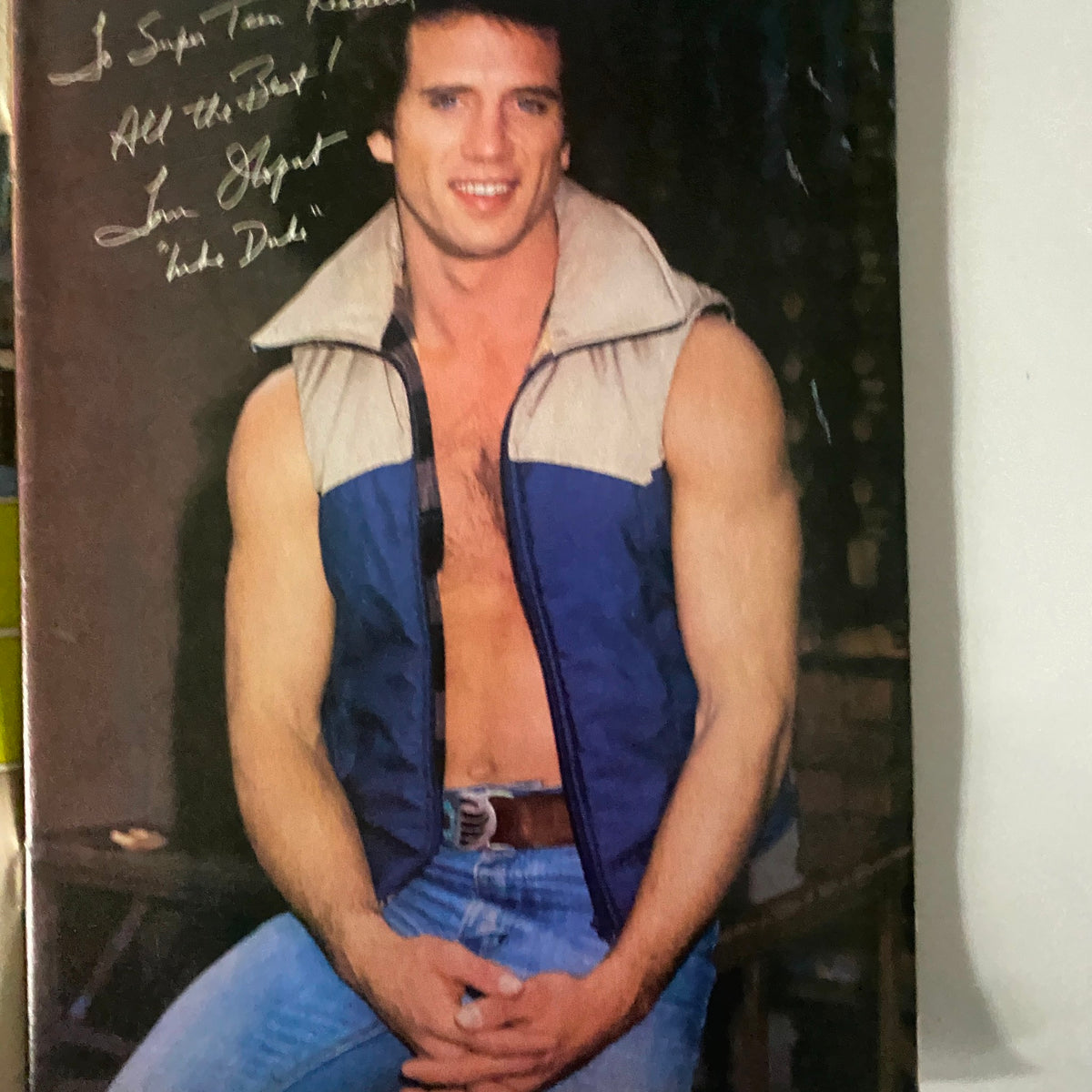 Photo of a muscular actor from SuperTeen Magazine August 1981, showcasing a casual style with a friendly inscription.