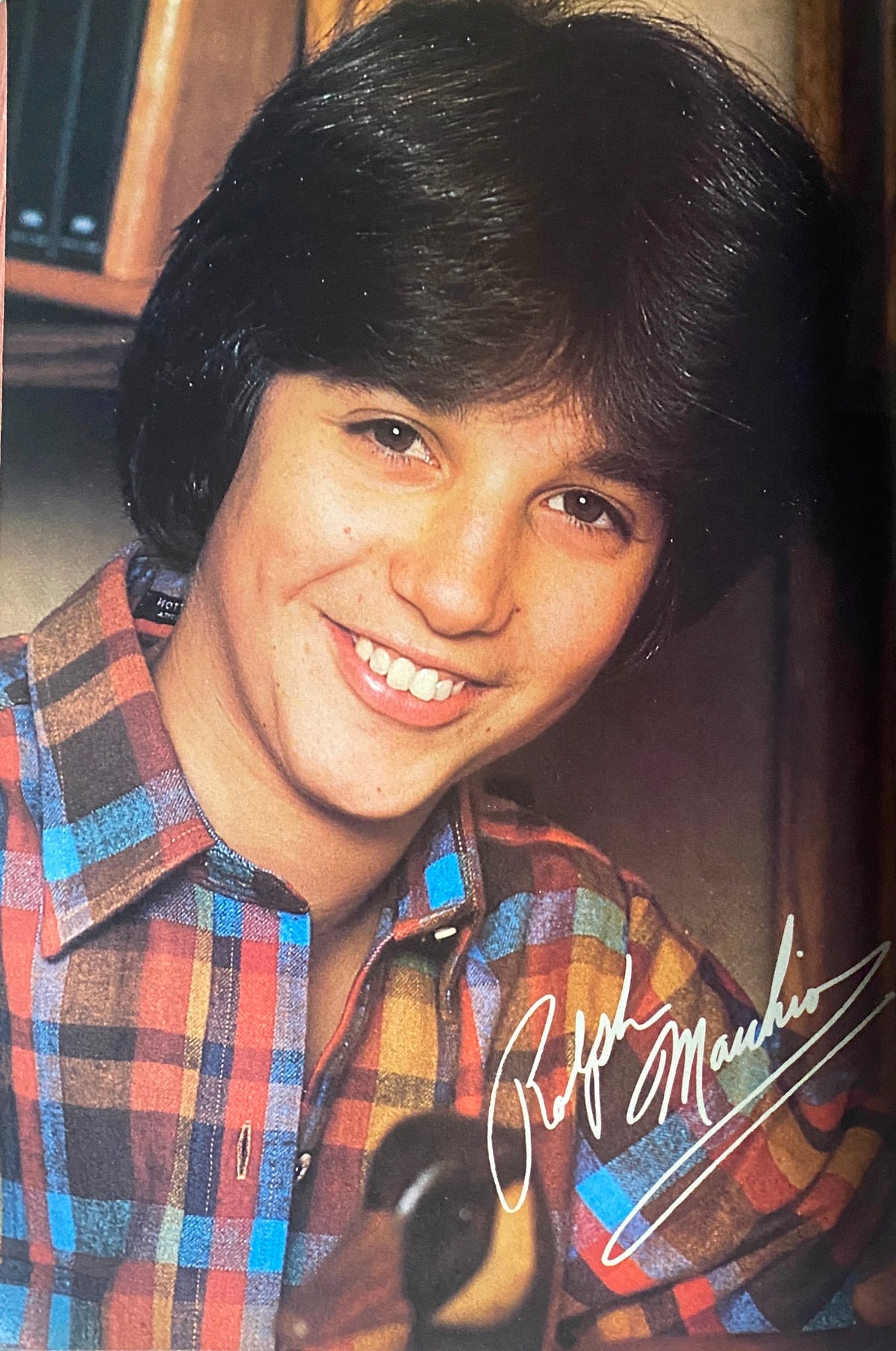 A featured photo of Ralph Macchio in 'SuperTeen Magazine' August 1982, smiling in plaid attire, representing the iconic teen culture of the early '80s.