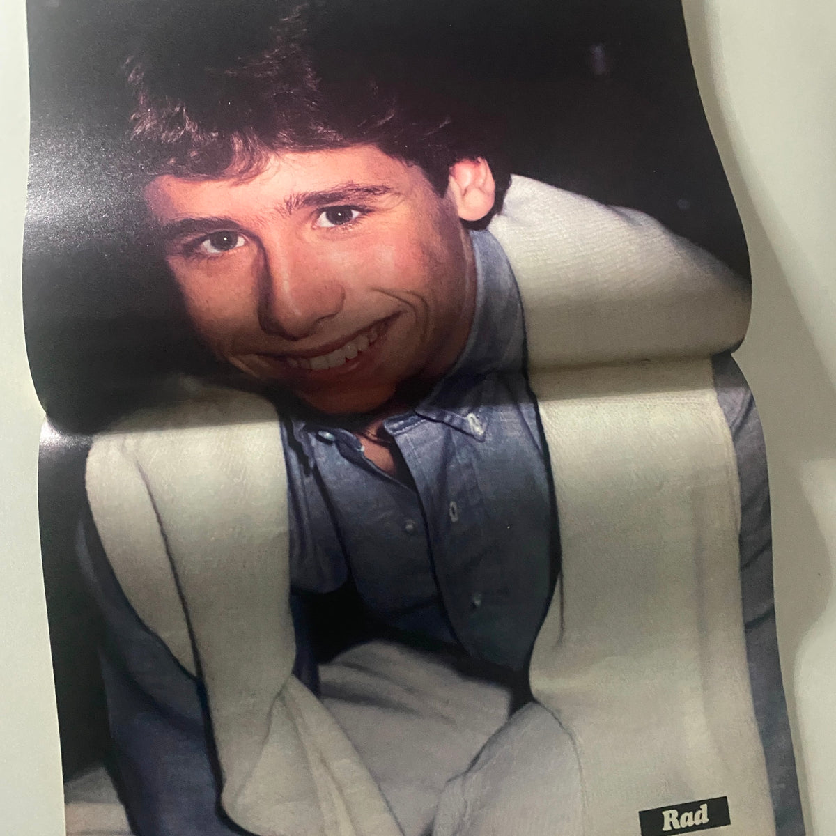 Poster image of a smiling young male celebrity from Teen Bag Fall Annual showcasing Rad Daly, providing nostalgia of 1980s teen culture.