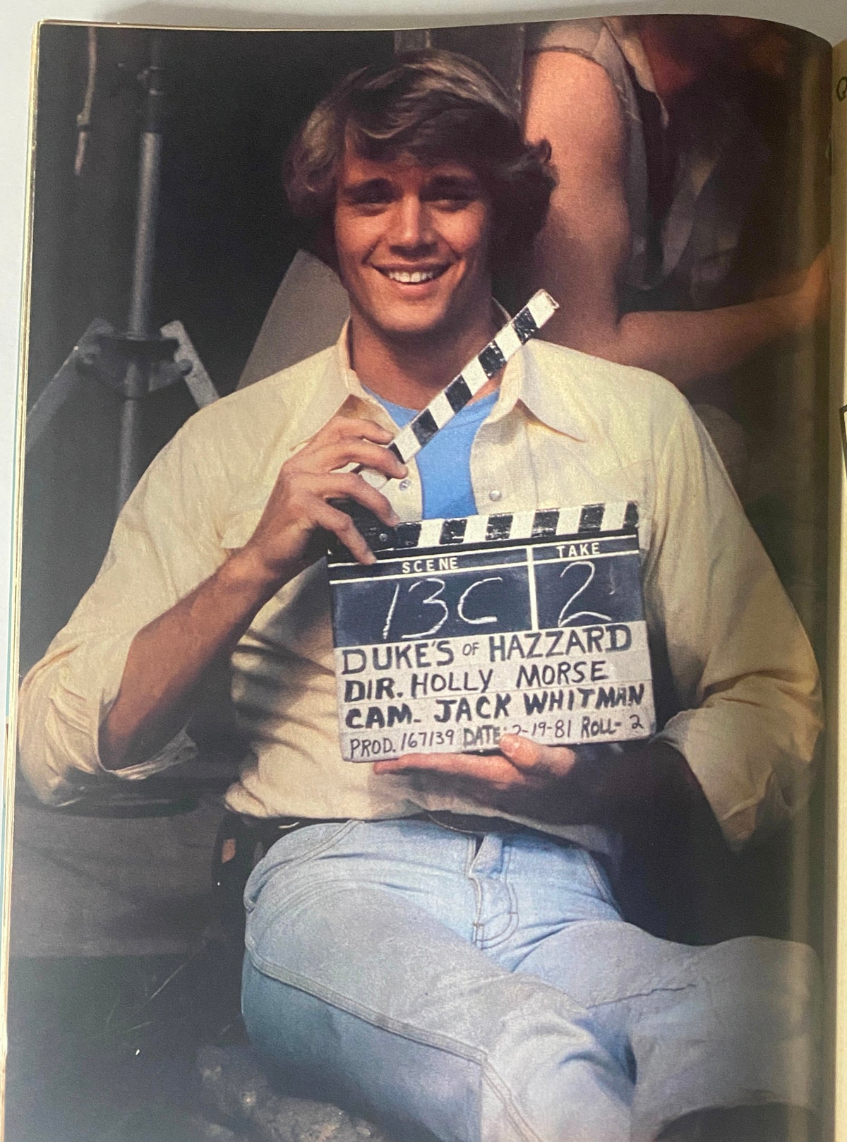 Teen Bag Fall Annual featuring Scott Baio, Ralph Macchio, John Schneider. Image captures a joyful actor holding a clapperboard on the set of 'Dukes of Hazzard', showcasing 1980s pop culture.