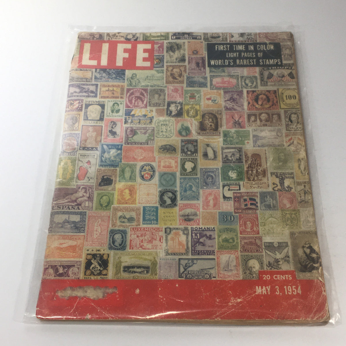 Cover of VTG Life Magazine from May 3, 1954, featuring a colorful collage of the world's rarest stamps.