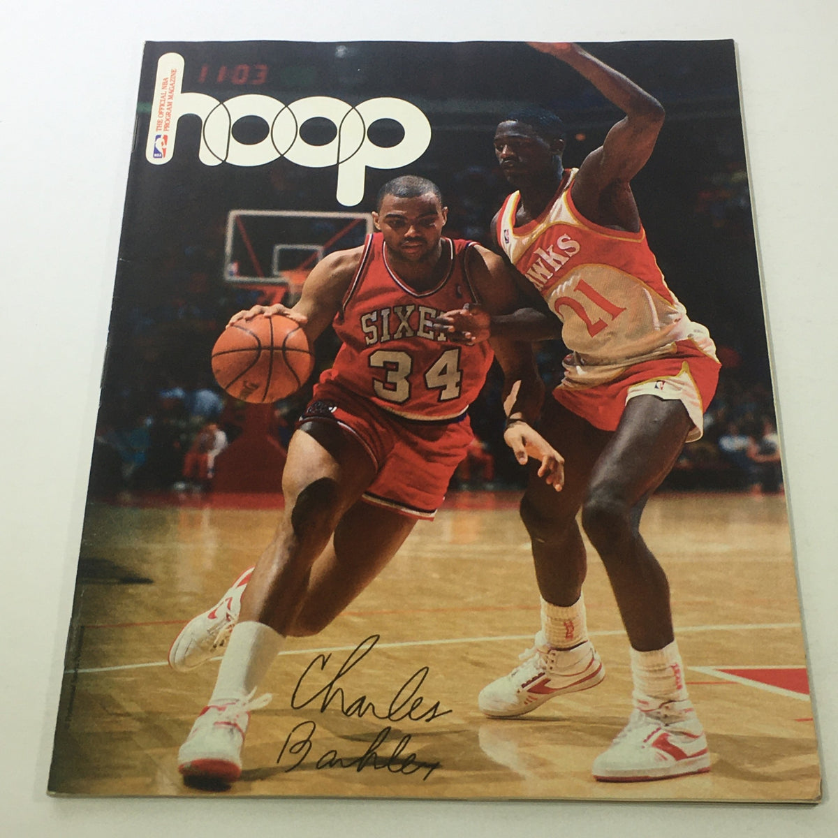 Hoop NBA Magazine: 1980s - Charles Barkley Signature Cover featuring Charles Barkley in a Philadelphia 76ers uniform, dribbling a basketball during a game.