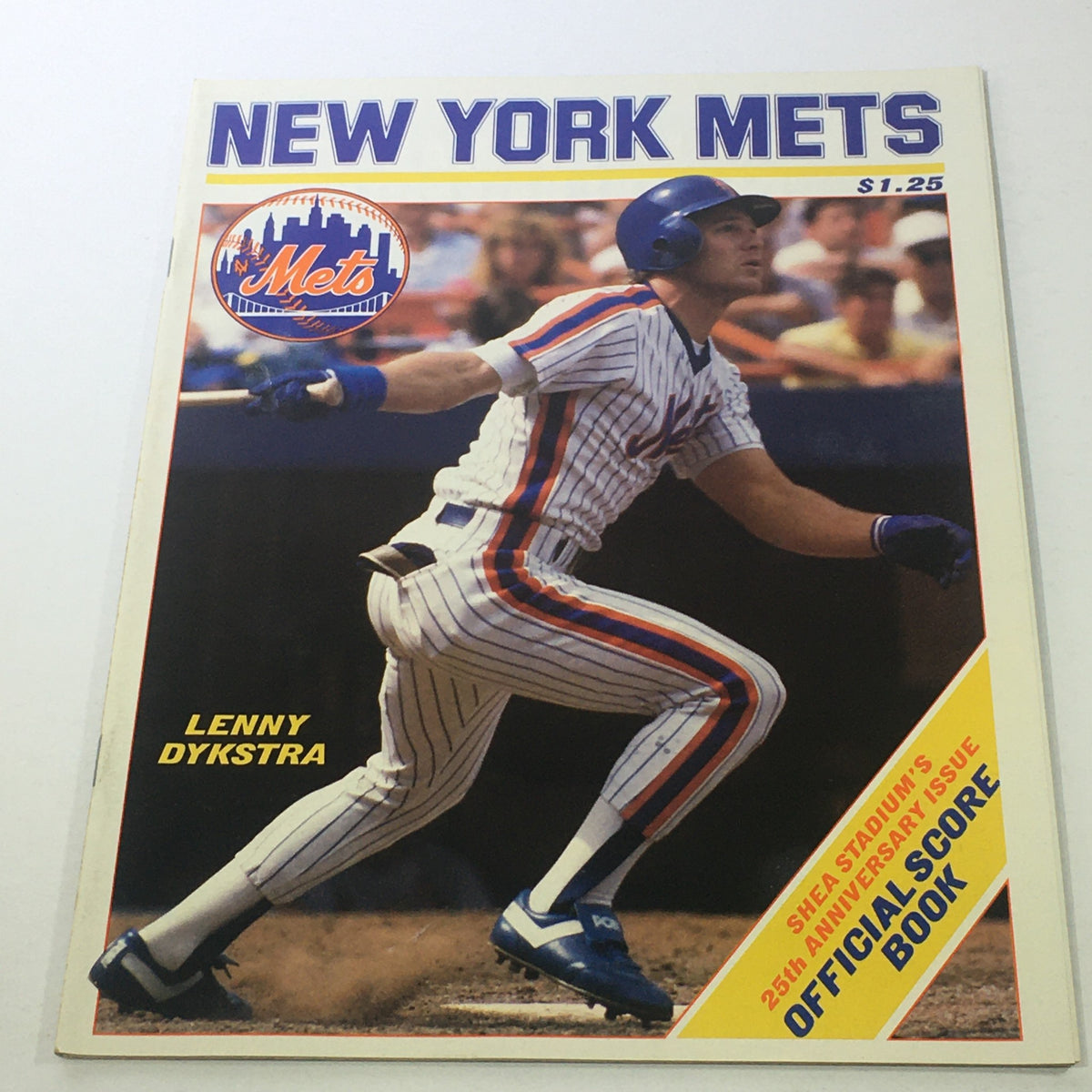 New York Mets Official Score Book: 1986 25th Anniversary Special featuring Lenny Dykstra, showcasing the Mets player in action, commemorating the team's historic 1986 baseball season.