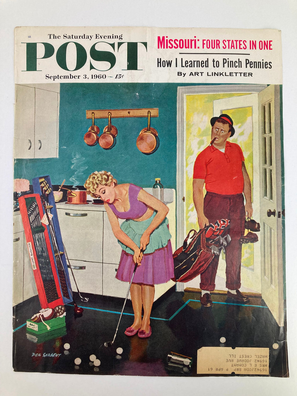 Cover only of The Saturday Evening Post, dated September 3, 1960, showcasing a humorous kitchen scene with a woman practicing golf while a man looks on, representing the charm of mid-20th century American culture.