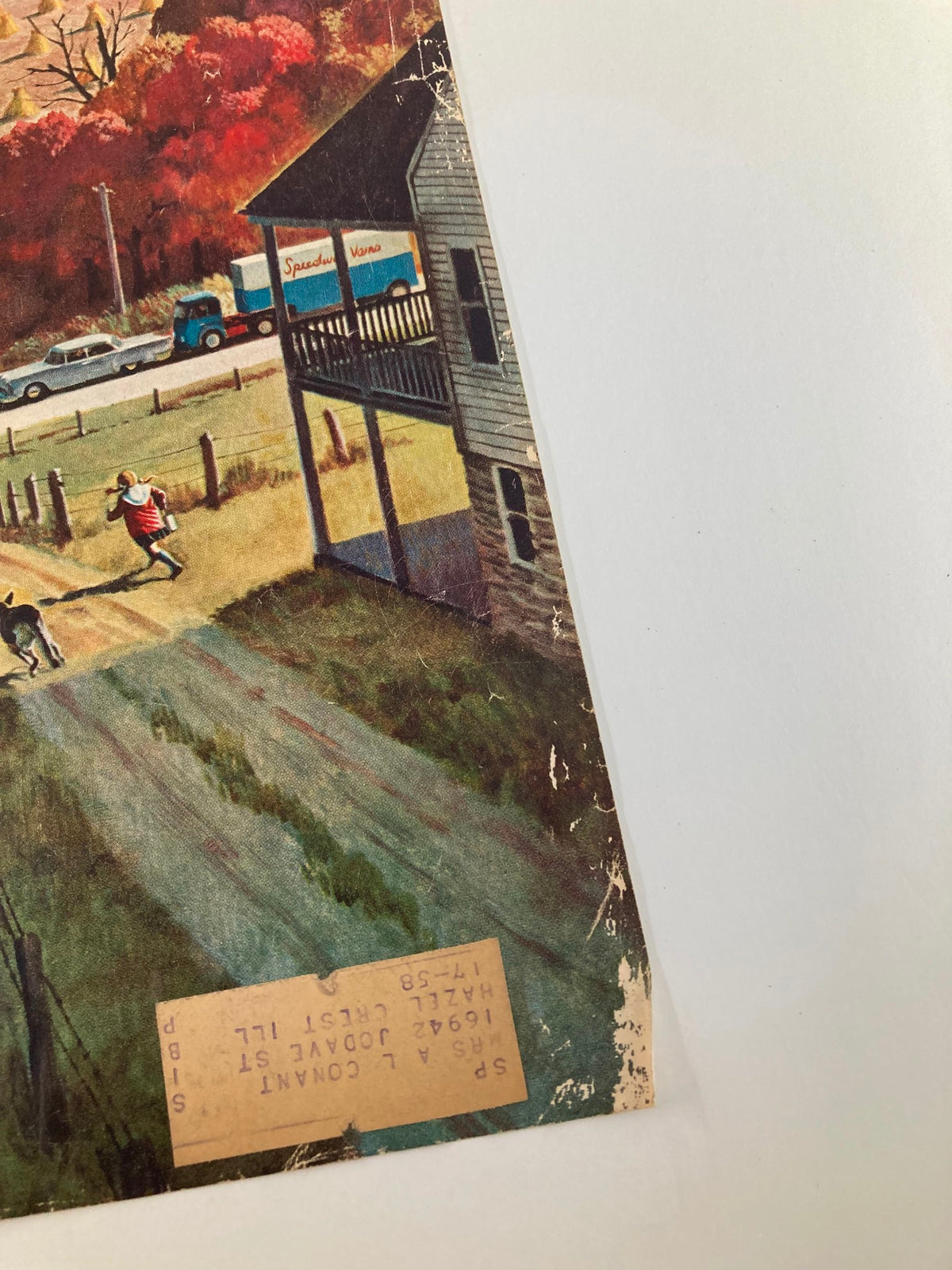 Close-up view of the lower corner of The Saturday Evening Post cover from October 12, 1957, highlighting the label and details of the magazine's condition.