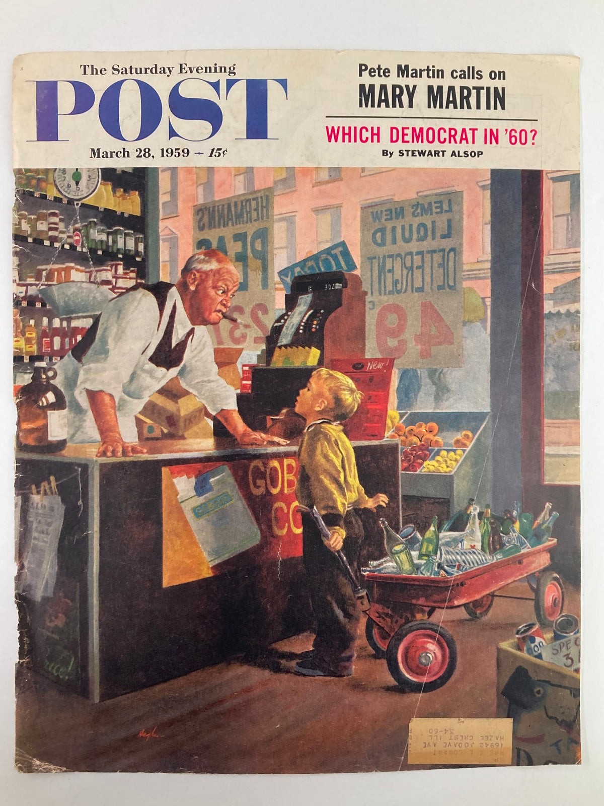 The Saturday Evening Post cover from March 28, 1959 showcasing artwork by Pete Martin and Mary Martin, illustrating a nostalgic grocery store interaction between an elderly man and a young boy with a wagon.