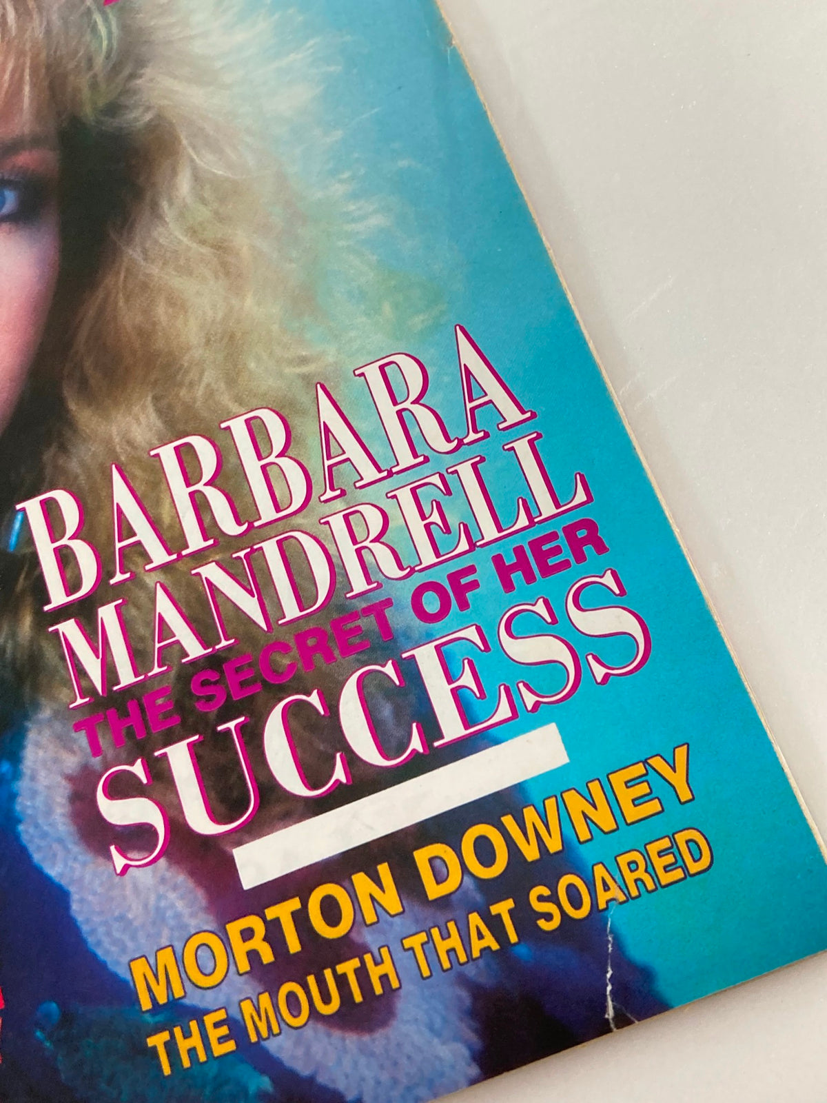 Close-up of the cover of VTG Showbiz Magazine from November 27, 1988, highlighting the names Barbara Mandrell and Morton Downey, emphasizing their significance in entertainment during the 80s.