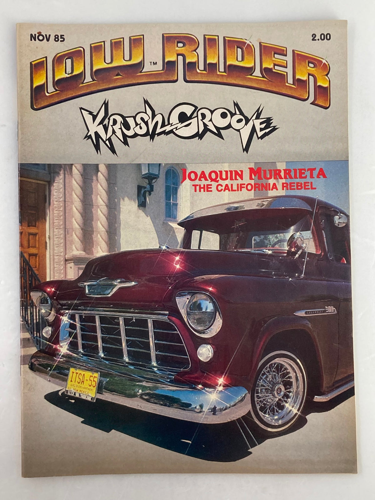 Cover of Low Rider Magazine November 1985 featuring Joaquin Murrieta, a classic car, and the title 'Krush Groove'.