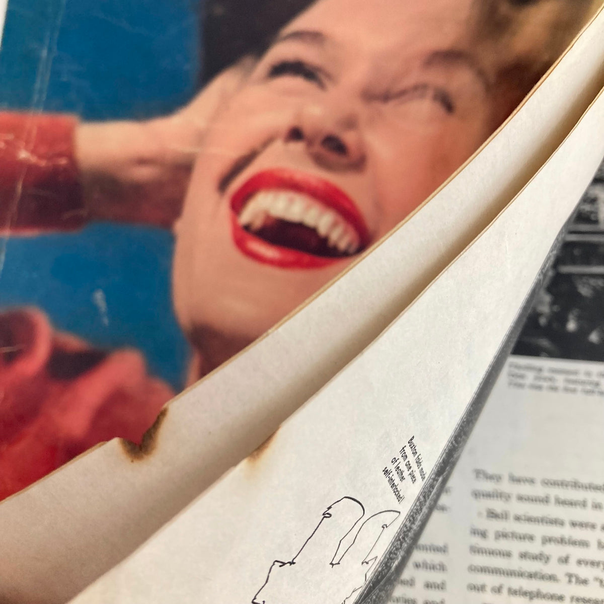 Close-up of the cover of VTG Look Magazine August 6, 1946, illustrating vintage beauty and hair styles with a joyful woman.