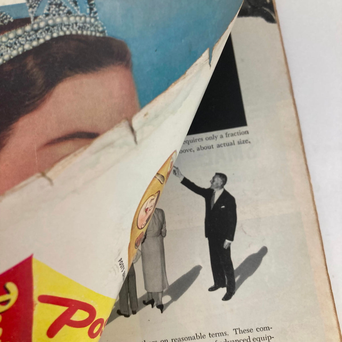 Inside view of the VTG Look Magazine May 10, 1953, highlighting a page with a slight rip, revealing historical moments related to the Coronation of Queen Elizabeth II.
