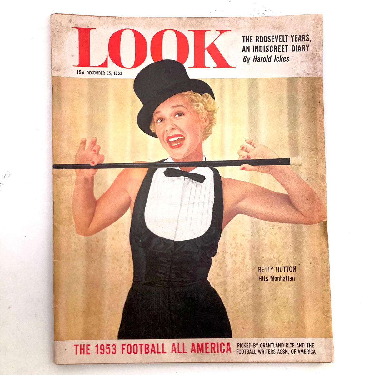 VTG Look Magazine December 15 1953 cover featuring Betty Hutton in a tuxedo with a top hat, showcasing her charm in Manhattan.