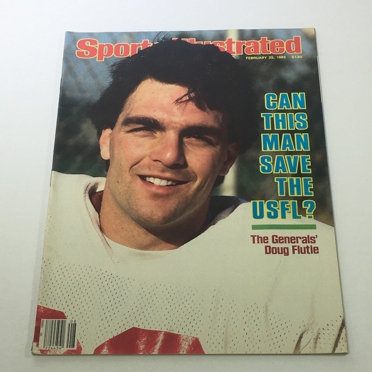 Vintage Sports Illustrated magazine from February 25, 1985 featuring NFL quarterback Doug Flutie on the cover, with the headline 'Can This Man Save the USFL?'. Perfect for collectors and sports enthusiasts.