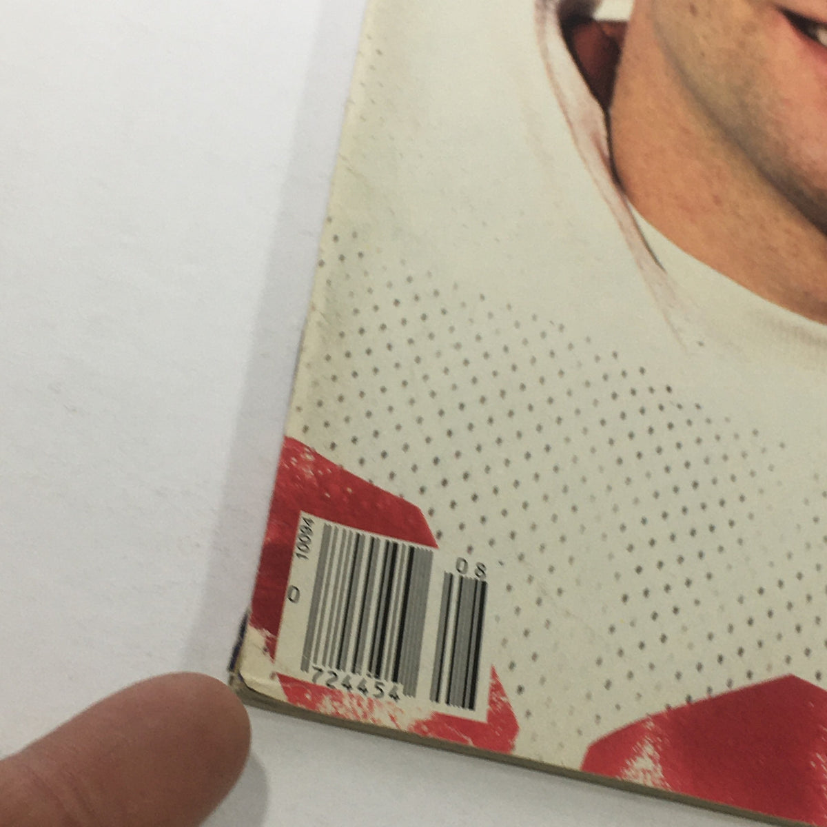 Close-up view of the back cover of the February 25, 1985 Sports Illustrated magazine showcasing Doug Flutie, displaying some wear typical of vintage magazines, ideal for sports memorabilia collectors.