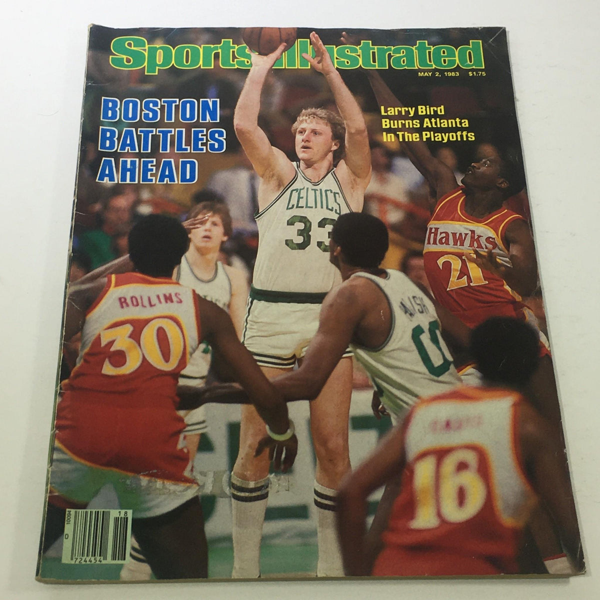Sports Illustrated cover from May 2, 1983, featuring NBA legend Larry Bird of the Boston Celtics, showcasing him in action against the Atlanta Hawks during the playoffs.