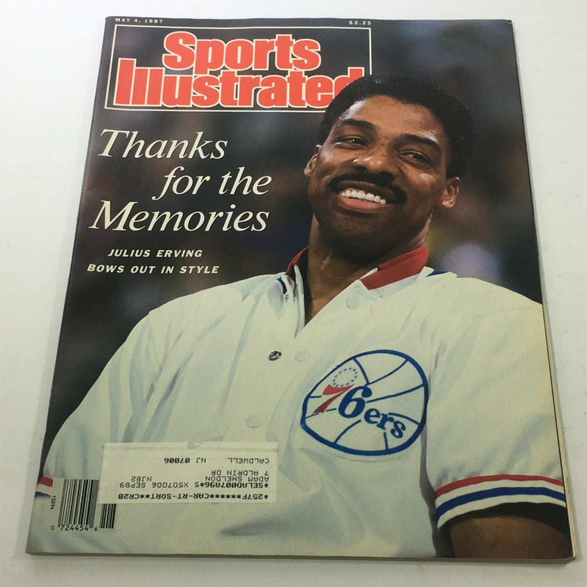 Cover of Sports Illustrated from May 4, 1987, featuring Julius Erving with the headline 'Thanks for the Memories'. The magazine highlights Erving's departure from professional basketball and includes imagery of the Philadelphia 76ers. Perfect collectible for sports enthusiasts.