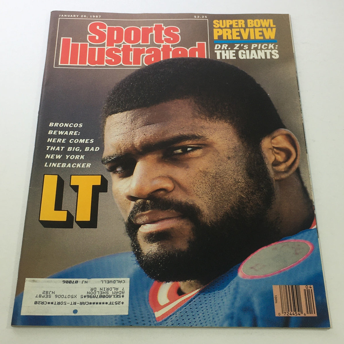 Sports Illustrated magazine cover from January 26, 1987, featuring NFL linebacker Lawrence Taylor, with a Super Bowl preview highlight.