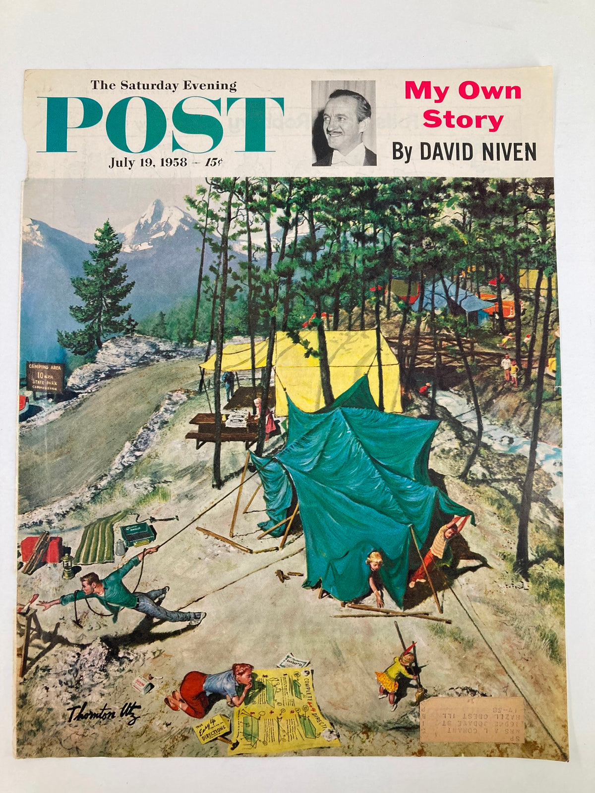 Cover of The Saturday Evening Post, July 19, 1958, highlighted by David Niven's 'My Own Story'. The cover features a vibrant camping scene with characters involved in setting up tents and enjoying the outdoors.
