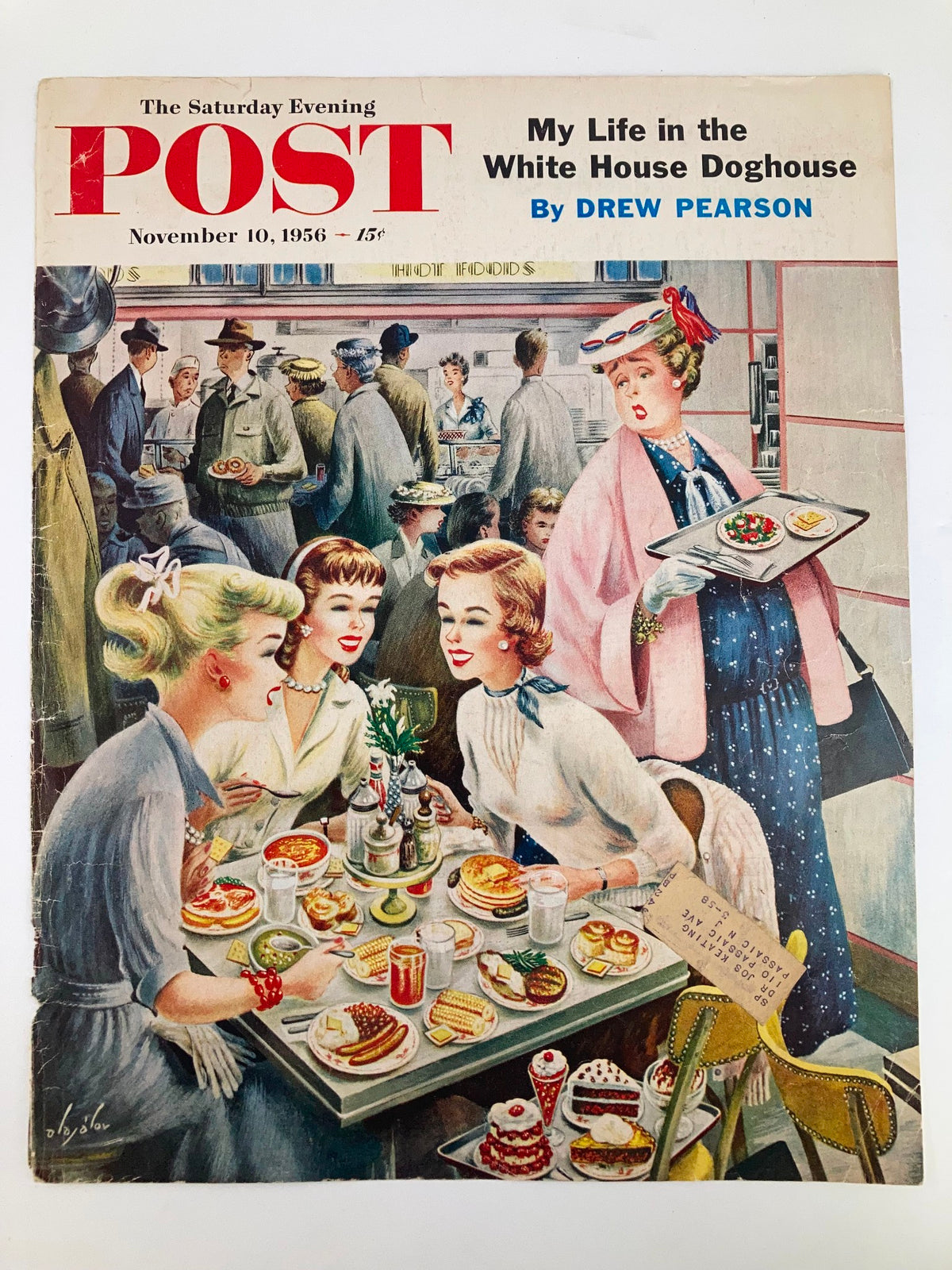 Cover of The Saturday Evening Post, November 10, 1956, titled 'My Life in the White House Doghouse' by Drew Pearson. The illustration features a lively scene of four women enjoying a variety of foods at a table, surrounded by people in a vintage dining setting. This iconic magazine cover captures the culture and nostalgia of the 1950s.