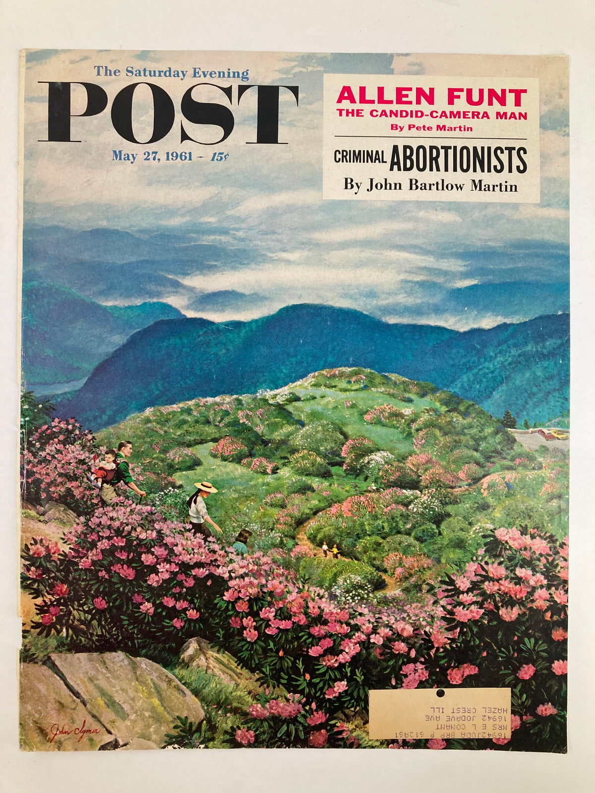 Vintage cover of The Saturday Evening Post from May 27, 1961 highlighting Allen Funt, the Candid-Camera Man, with picturesque mountains and blooming flowers.