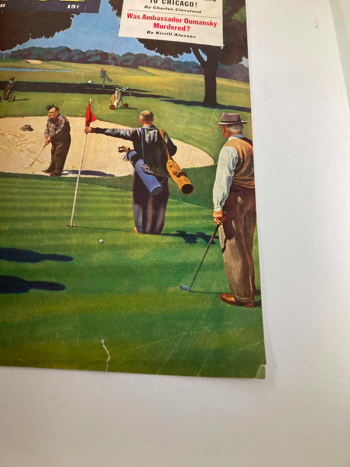 Close-up detail of The Saturday Evening Post cover from July 3, 1948, illustrating a golfing scene by Konstantin Umansky, highlighting players and a sand trap.