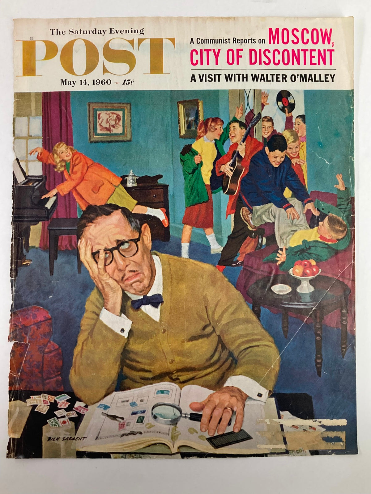 COVER ONLY The Saturday Evening Post May 14 1960 showcasing a chaotic scene of a worried man at his desk, with children enjoying themselves, reflecting on the mood of 'Moscow: City of Discontent.'