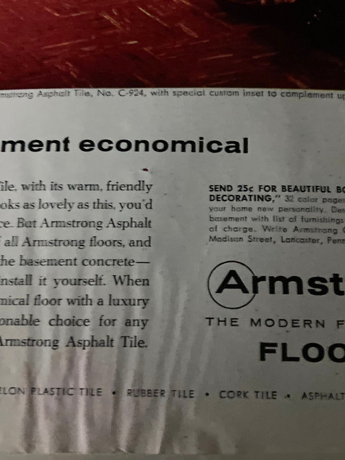 Back view of The Saturday Evening Post November 23 1957 showing advertising for Armstrong Asphalt Tile, featuring vintage design.