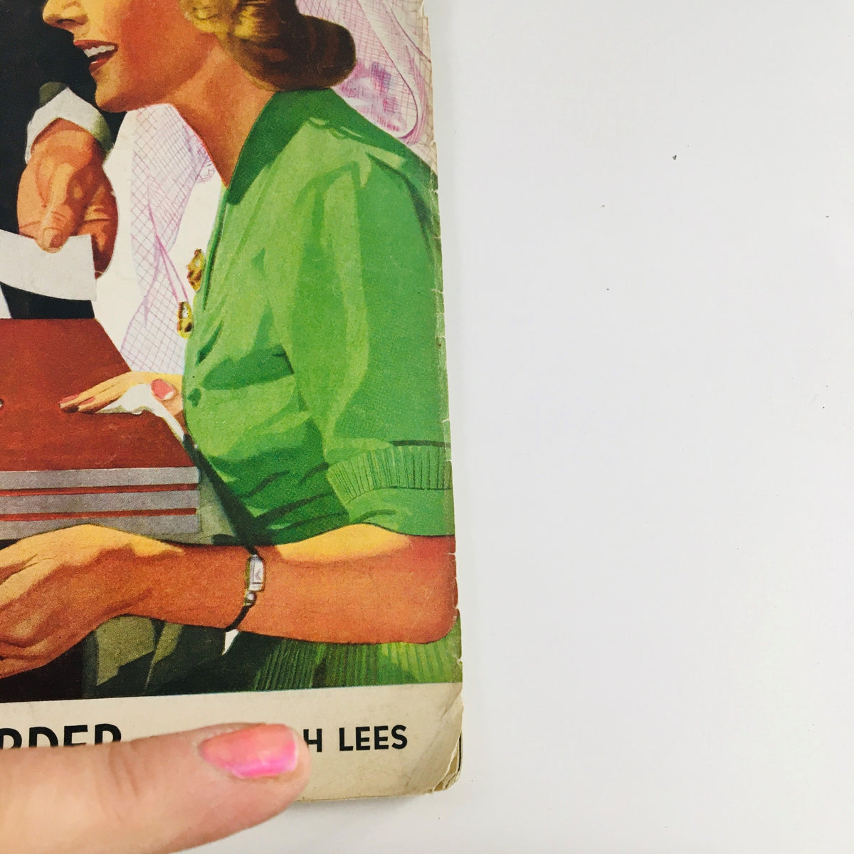 Close-up view of the cover of The Saturday Evening Post, September 6, 1941, by John Hyde Phillips, highlighting a woman in a green dress reaching for a dollar bill on a table, showcasing the vintage artwork.