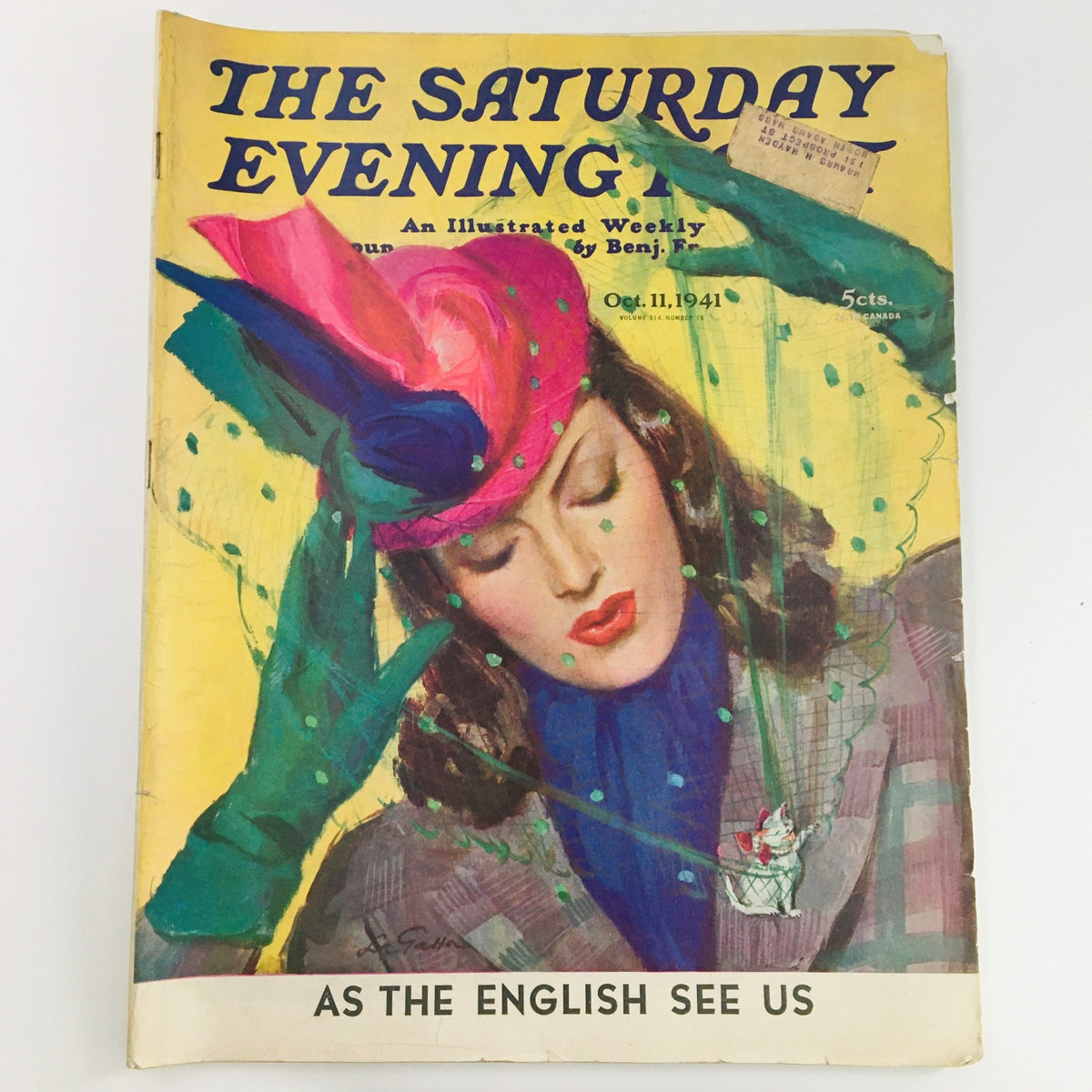 Cover illustration of The Saturday Evening Post from October 11, 1941, featuring a vibrant artwork by John LaGatta, depicting a glamorous woman wearing a colorful hat and green gloves, encapsulating mid-20th century American style.