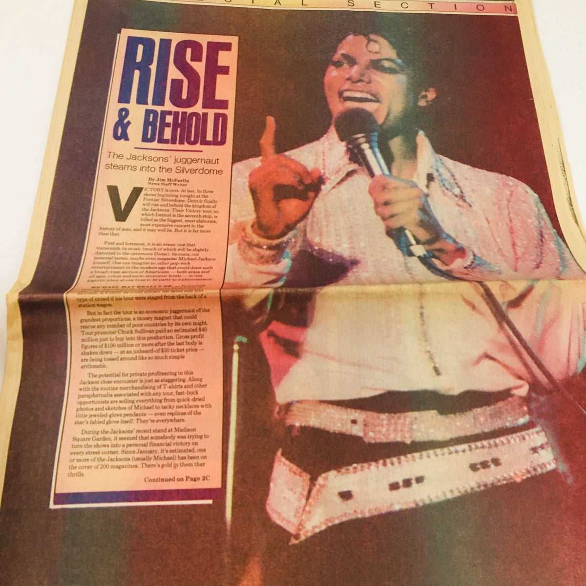 Close-up of The Detroit News from August 17, 1984, showcasing The Jacksons under the title 'Rise & Behold', depicting the excitement of their Silverdome concert.