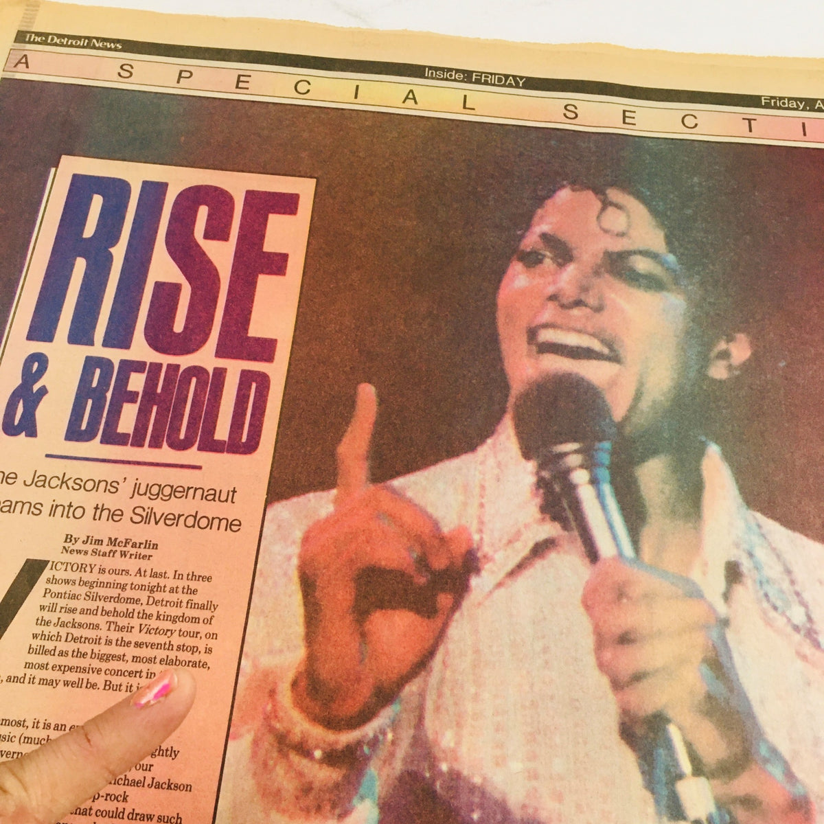 The Detroit News newspaper dated August 17, 1984, focused on The Jacksons with the title 'Rise & Behold', capturing a moment from their Silverdome performance.