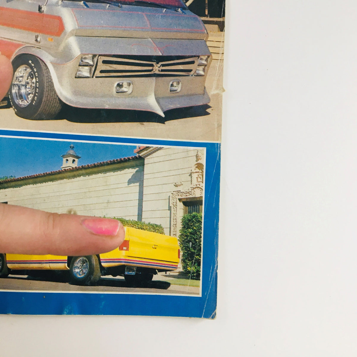 Close-up of the cover of Truckin' Magazine April 1976, Volume 2, Issue 4 highlighting a customized truck and details about Toys for Tots in Northern California.